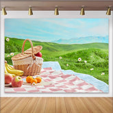 Lofaris Charming Picnic Photography Backdrop with Wicker Basket and Fruits, Lush Green Hills Studio Outdoor Photoshoot