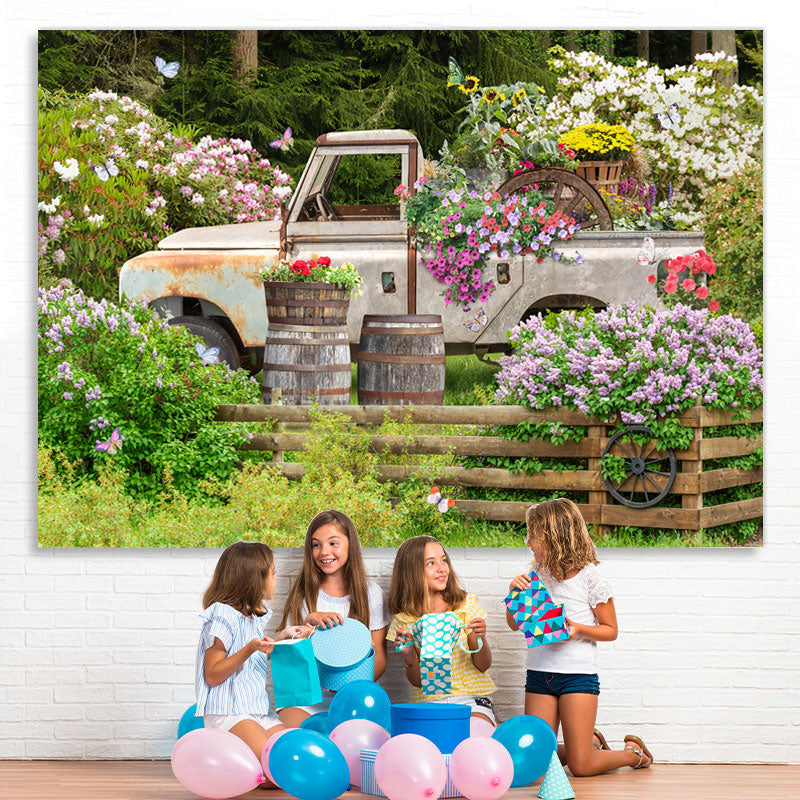 Lofaris Green And Floral Garden With A Truck Spring Backdrop