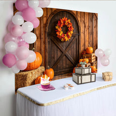 Lofaris Rustic Wooden Barn Door Autumn Harvest Backdrop with Pumpkins, Fall Leaves and Wreath Photography Background for Seasonal Decor.