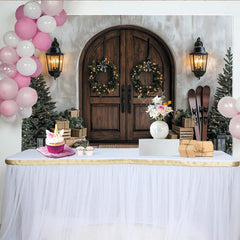 Lofaris Rustic Wooden Door Christmas Backdrop, Winter Holiday Scene with Wreaths, Trees, and Gifts